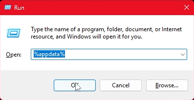 A screenshot of the Windows "Run" window, with %appdata% entered in the Run field and the mouse hovering over the OK button.