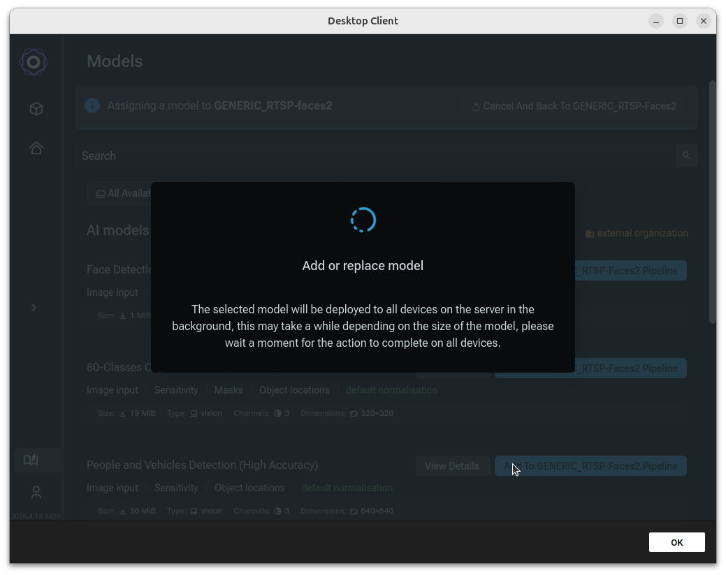 Add or replace model dialog showing the model deployment is in progress with a spinner