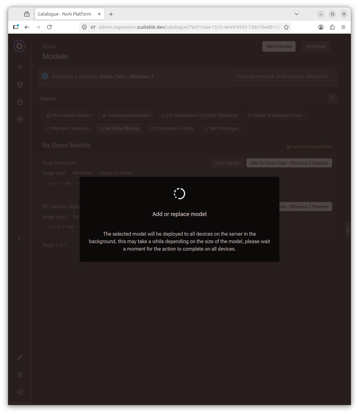 Add or replace model dialog with a spinner and a message that the selected model will
     be deployed to all devices on the server in the background